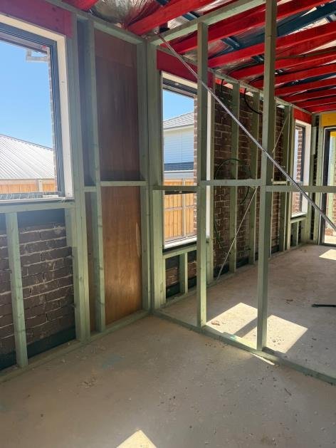 Subfloor bearer and joist installation — spacing and connections compliant — no action required.